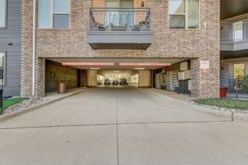 A building with a red sign that says "EXIT" is shown.